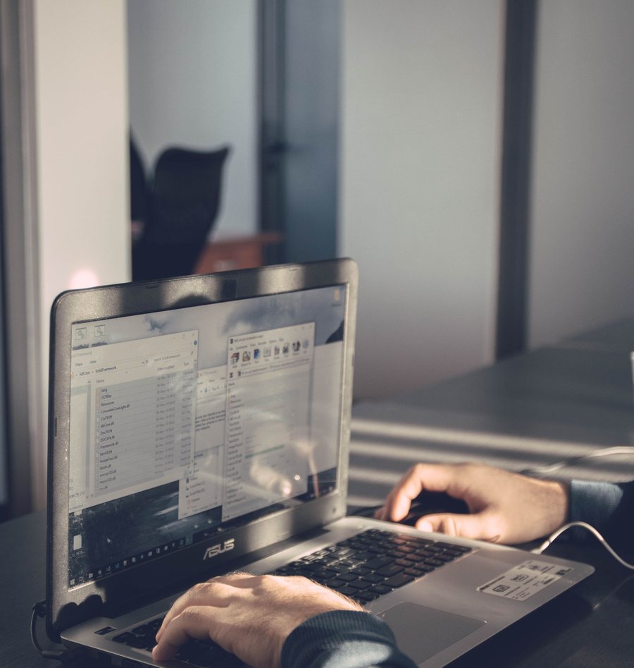 Working on a laptop, building a small business website